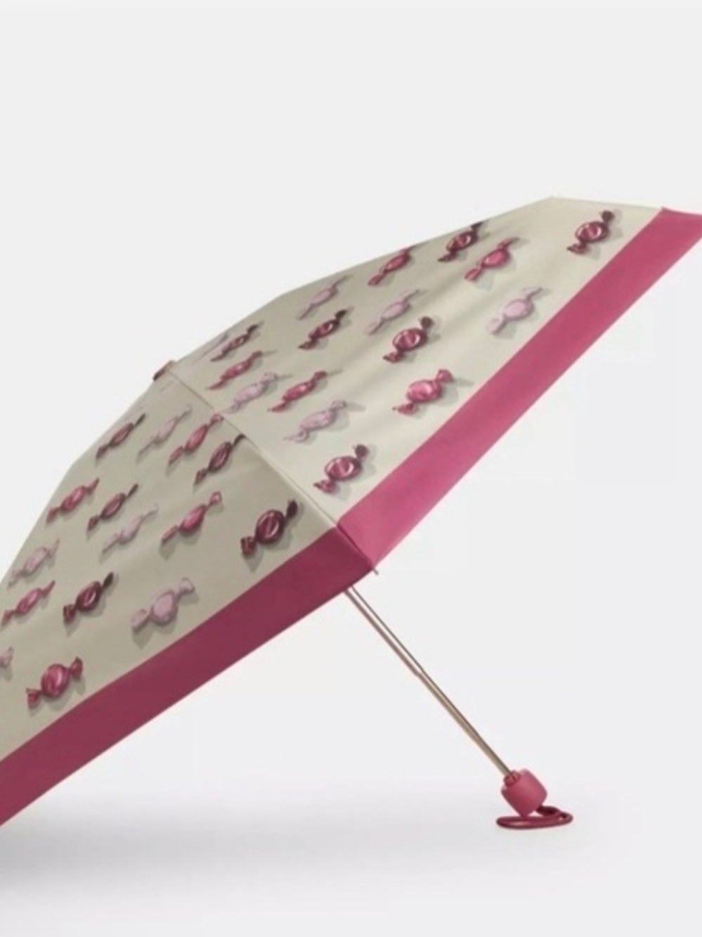 Coach Pink and Cream Candy-Pattern Compact Umbrella